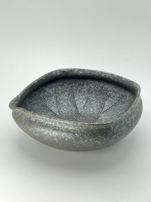 Handcrafted Bowl Pouring Charcoal